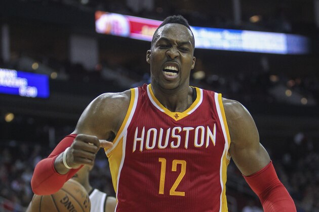 Nov 6, 2014; Houston, TX, USA; Houston Rockets center Dwight Howard (12) reacts after a play during the third quarter against the San Antonio Spurs at Toyota Center. The Rockets defeated the Spurs 98-81. Mandatory Credit: Troy Taormina-USA TODAY Sports