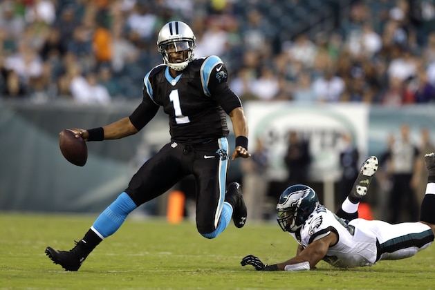 Carolina Panthers quarterback Cam Newton in action during the first half of a preseason NFL football game against the Philadelphia Eagles, Thursday, Aug. 15, 2013, in Philadelphia. (AP Photo/Matt Rourke)