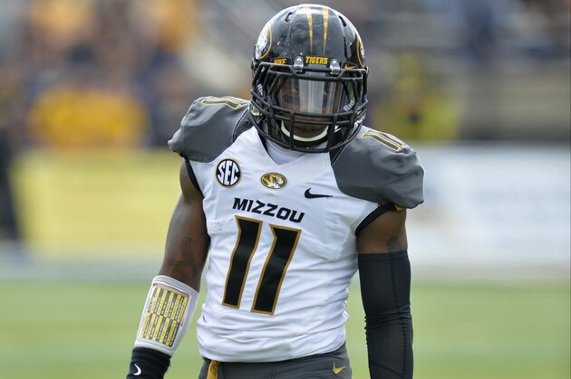 Missouri Tigers defensive back Aarion Penton (11) lines up in the third quarter of a 49-24 win over the Toledo Rockets in an NCAA college football game in Toledo, Ohio, Saturday, Sept. 6, 2014. (AP Photo/David Richard)