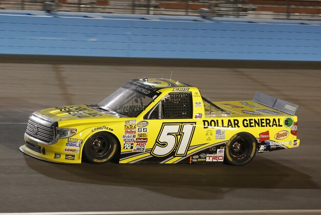 Driver Erik Jones during a NASCAR Camping World Truck Series auto race at Phoenix International Raceway in Avondale, Ariz., Friday, Nov. 7, 2014. (AP Photo/Rick Scuteri)