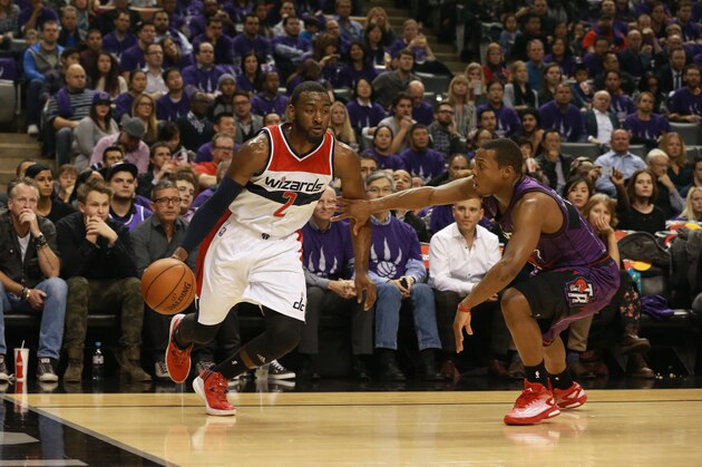 TORONTO, CANADA - NOVEMBER 7: John Wall #2 of the Washington Wizards handles the ball against the Toronto Raptors during the game on November 7, 2014 at the Air Canada Centre in Toronto, Ontario, Canada.  NOTE TO USER: User expressly acknowledges and agrees that, by downloading and or using this Photograph, user is consenting to the terms and conditions of the Getty Images License Agreement.  Mandatory Copyright Notice: Copyright 2014 NBAE (Photo by Dave Sandford/NBAE via Getty Images)