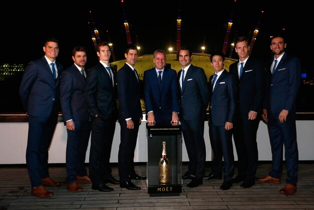 LONDON, ENGLAND - NOVEMBER 07:  Novak Djokovic of Serbia, Stan Wawrinka of Switzerland, Tomas Berdych of Czech Republic, Marin Cilic of Croatia, Roger Federer of Switzerland, Andy Murray of Great Britain, Kei Nishikori of Japan, Milos Raonic of Canada with Chris Kermode Executive Chairman & President ATP pose for a photo as they travel along the thames during the Barclays ATP World Tour Finals tennis previews at the O2 Arena on November 7, 2014 in London, England.  (Photo by Julian Finney/Getty Images)
