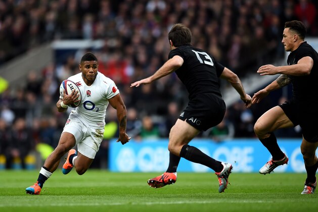 LONDON, ENGLAND - NOVEMBER 08: Kyle Eastmond of England takes on the New Zealand defence during the QBE International match between England and New Zealand at Twickenham Stadium on November 8, 2014 in London, England.  (Photo by Laurence Griffiths/Getty Images)