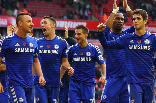 LIVERPOOL, ENGLAND - NOVEMBER 08: John Terry, Gary Cahill, Didier Drogba and Oscar of Chelsea celebrate victory after the Barclays Premier League match between Liverpool and Chelsea at Anfield on November 8, 2014 in Liverpool, England.  (Photo by Alex Livesey/Getty Images)