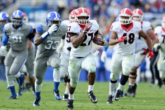 LEXINGTON, KY - NOVEMBER 08:  Nick Chubb #27 of the Georgia Bulldogs runs with the ball during the game against the Kentucky Wildcats at Commonwealth Stadium on November 8, 2014 in Lexington, Kentucky.  (Photo by Andy Lyons/Getty Images)