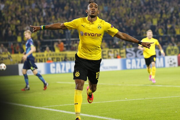 Dortmund's Pierre-Emerick Aubameyang celebrates his side's second goal during the Champions League group D soccer match between Borussia Dortmund and Arsenal in Dortmund, Germany, Tuesday, Sept.16,2014. (AP Photo/Frank Augstein)