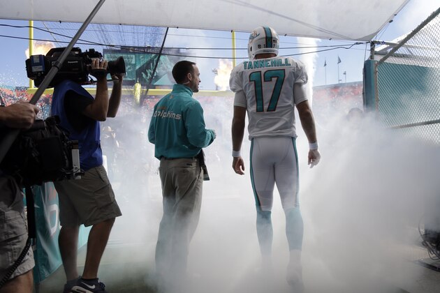 Miami Dolphins quarterback Ryan Tannehill (17) waits to walk out of the tunnel before an NFL football game against the San Diego Chargers, Sunday, Nov. 2, 2014, in Miami Gardens, Fla.  (AP Photo/Lynne Sladky)