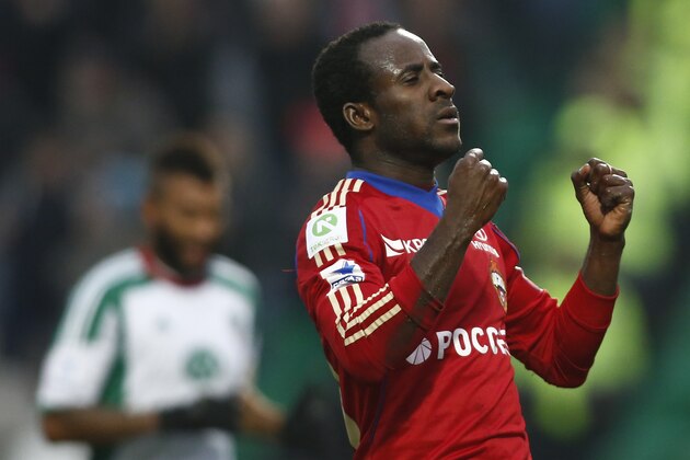 CSKA Moscow's Seydou Doumbia celebrates after scoring a goal during a Russian Premier League Championship soccer match between CSKA Moscow and Terek Grozny at a stadium in Moscow, Russia, Sunday, Nov. 10, 2013. CSKA won 4-1. (AP Photo/Denis Tyrin)