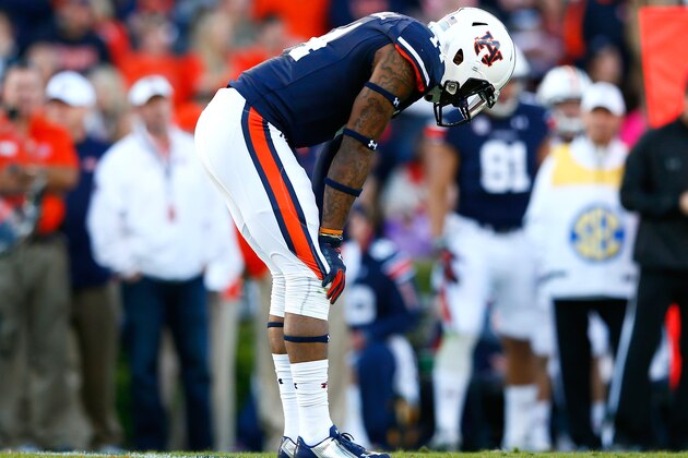 AUBURN, AL - NOVEMBER 08:  Nick Marshall #14 of the Auburn Tigers reacts after overthrowing a receiver against the Texas A&M Aggies at Jordan Hare Stadium on November 8, 2014 in Auburn, Alabama.  (Photo by Kevin C. Cox/Getty Images)