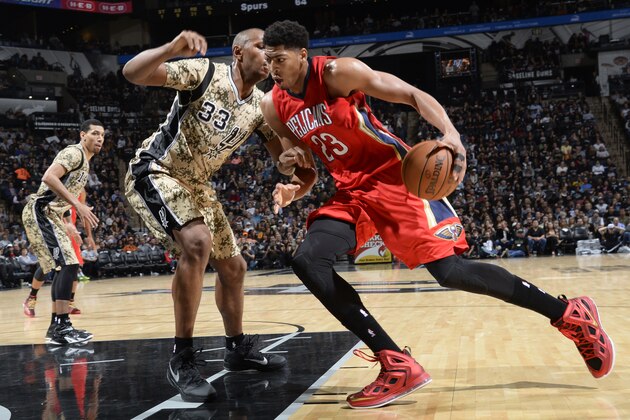 SAN ANTONIO, TX - NOVEMBER 8: Anthony Davis #23 of the New Orleans Pelicans handles the ball against the San Antonio Spurs at the AT&T Center on November 8, 2014 in San Antonio, Texas. NOTE TO USER: User expressly acknowledges and agrees that, by downloading and or using this photograph, user is consenting to the terms and conditions of the Getty Images License Agreement. Mandatory Copyright Notice: Copyright 2014 NBAE (Photos by D. Clarke Evans/NBAE via Getty Images)