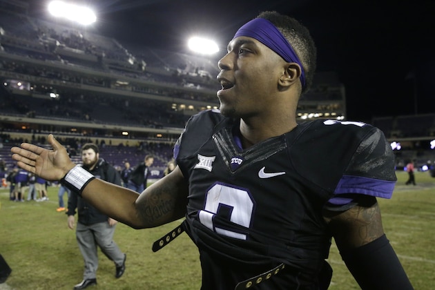 TCU quarterback Trevone Boykin is congratulated as he walks off the field after an NCAA college football game against Kansas State on Saturday, Nov. 8, 2014, in Fort Worth, Texas. TCU 41-20. (AP Photo/LM Otero)