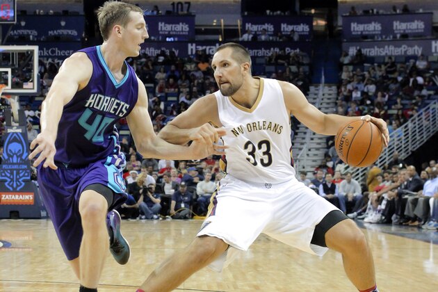 New Orleans Pelicans forward Ryan Anderson (33) pulls up against Charlotte Hornets center Cody Zeller (40) in the second half of an NBA basketball game in New Orleans, Tuesday, Nov. 4, 2014. The Pelicans won 100-91. (AP Photo/Scott Threlkeld)