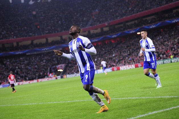 FC Porto Jackson Martinez, left, celebrates his goal after scoring during the Champions League Group H soccer match between Athletic Bilbao and FC Porto, at San Mames stadium, in Bilbao, northern Spain, Wednesday, Nov.5, 2014. (AP Photo/Alvaro Barrientos)