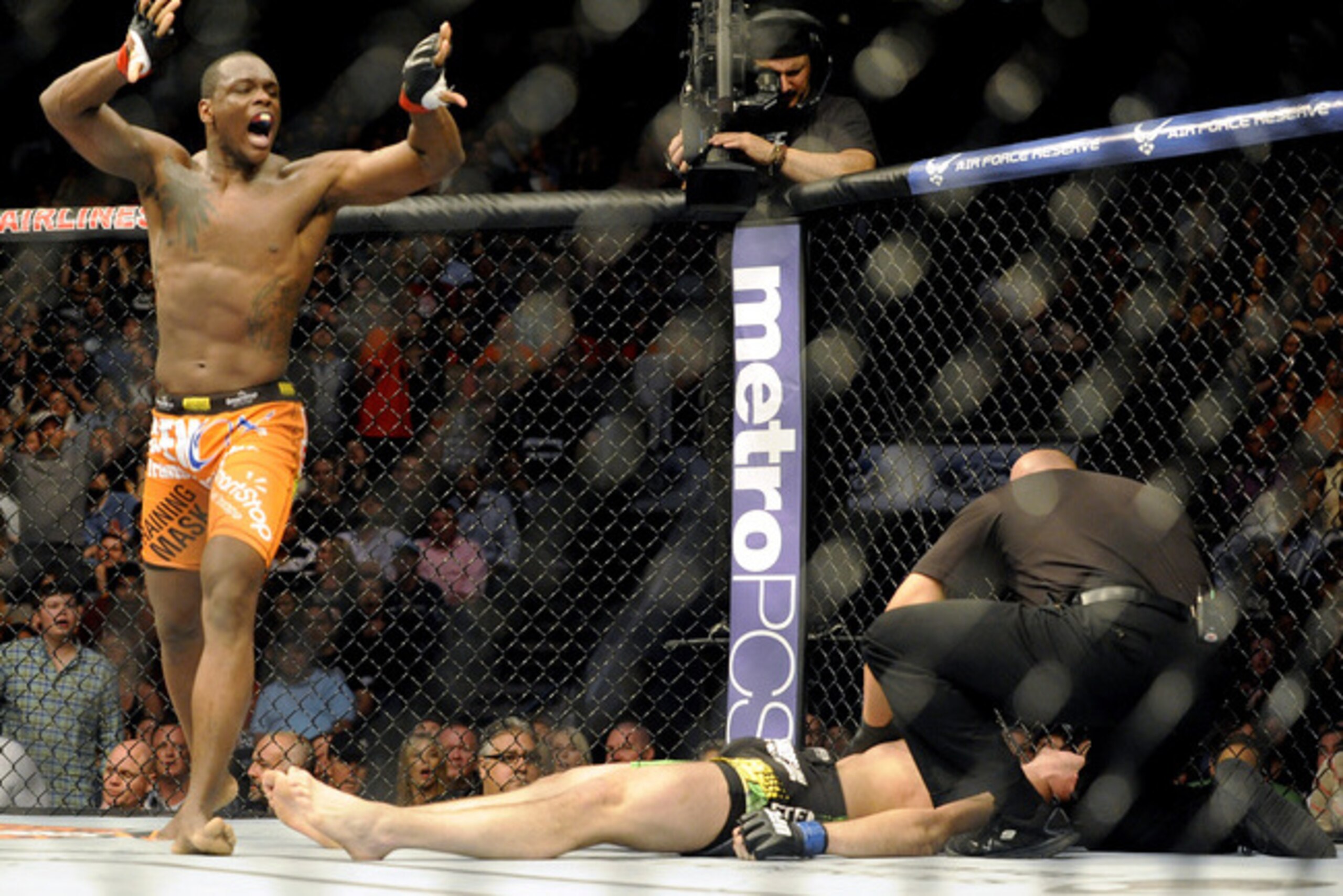 Ovince St. Preux celebrates his submission win over Nikita Krylov during a UFC 171 mixed martial arts light heavyweight bout, Saturday, March 15, 2014, in Dallas. (AP Photo/Matt Strasen)