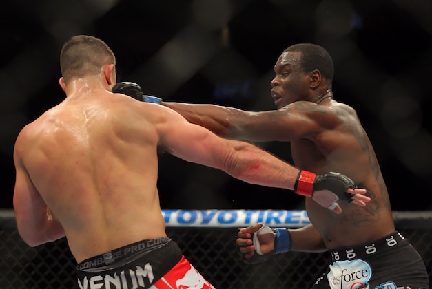 Apr 27, 2013; Newark, NJ, USA; Gian Villante ( red shorts) competes against Ovince St. Preux (black  shorts) during UFC 159 at the Prudential Center. Mandatory Credit: Brad Penner-USA TODAY Sports