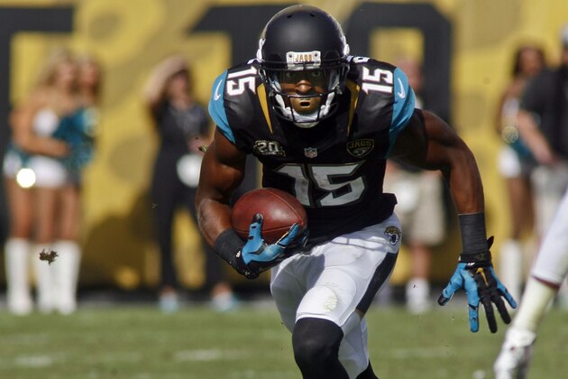 Oct 19, 2014; Jacksonville, FL, USA; Jacksonville Jaguars wide receiver Allen Robinson (15) runs after a catch in the fourth quarter of their game against the Cleveland Browns at EverBank Field. The Jacksonville Jaguars best the Cleveland Browns 24-6. Mandatory Credit: Phil Sears-USA TODAY Sports