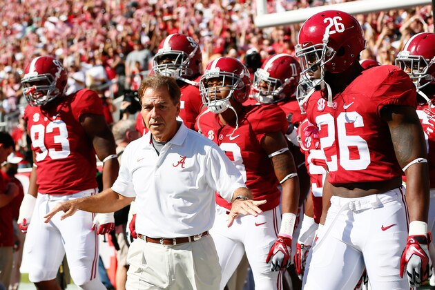 TUSCALOOSA, AL - OCTOBER 18:  Head coach Nick Saban of the Alabama Crimson Tide leads his team onto the field prior to facing the Texas A&M Aggies at Bryant-Denny Stadium on October 18, 2014 in Tuscaloosa, Alabama.  (Photo by Kevin C. Cox/Getty Images)
