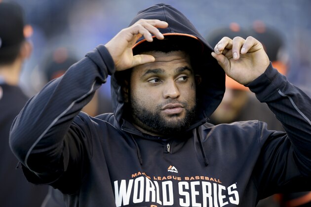 San Francisco Giants third baseman Pablo Sandoval arrives for Game 7 of baseball's World Series against the Kansas City Royals Wednesday, Oct. 29, 2014, in Kansas City, Mo. (AP Photo/Charlie Neibergall)