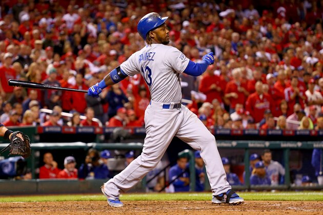 ST LOUIS, MO - OCTOBER 06:  Hanley Ramirez #13 of the Los Angeles Dodgers hits a RBI double in the sixth inning against the St. Louis Cardinals in Game Three of the National League Division Series at Busch Stadium on October 6, 2014 in St Louis, Missouri.  (Photo by Dilip Vishwanat/Getty Images)
