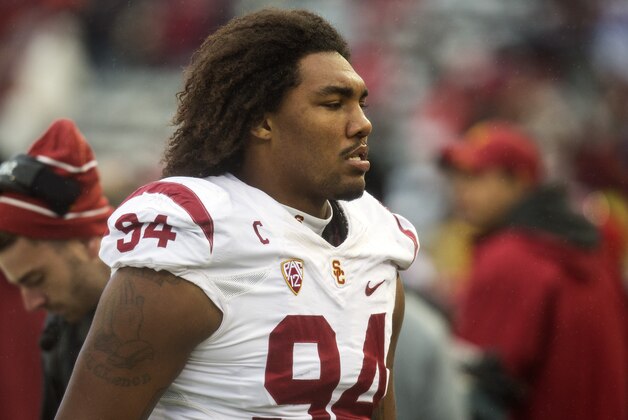 Southern California defensive end Leonard Williams (94) jogs to the bench before the start of an NCAA college football game against Washington State on Saturday, Nov. 1, 2014, at Martin Stadium in Pullman, Wash. Southern California won 44-17. (AP Photo/Dean Hare)
