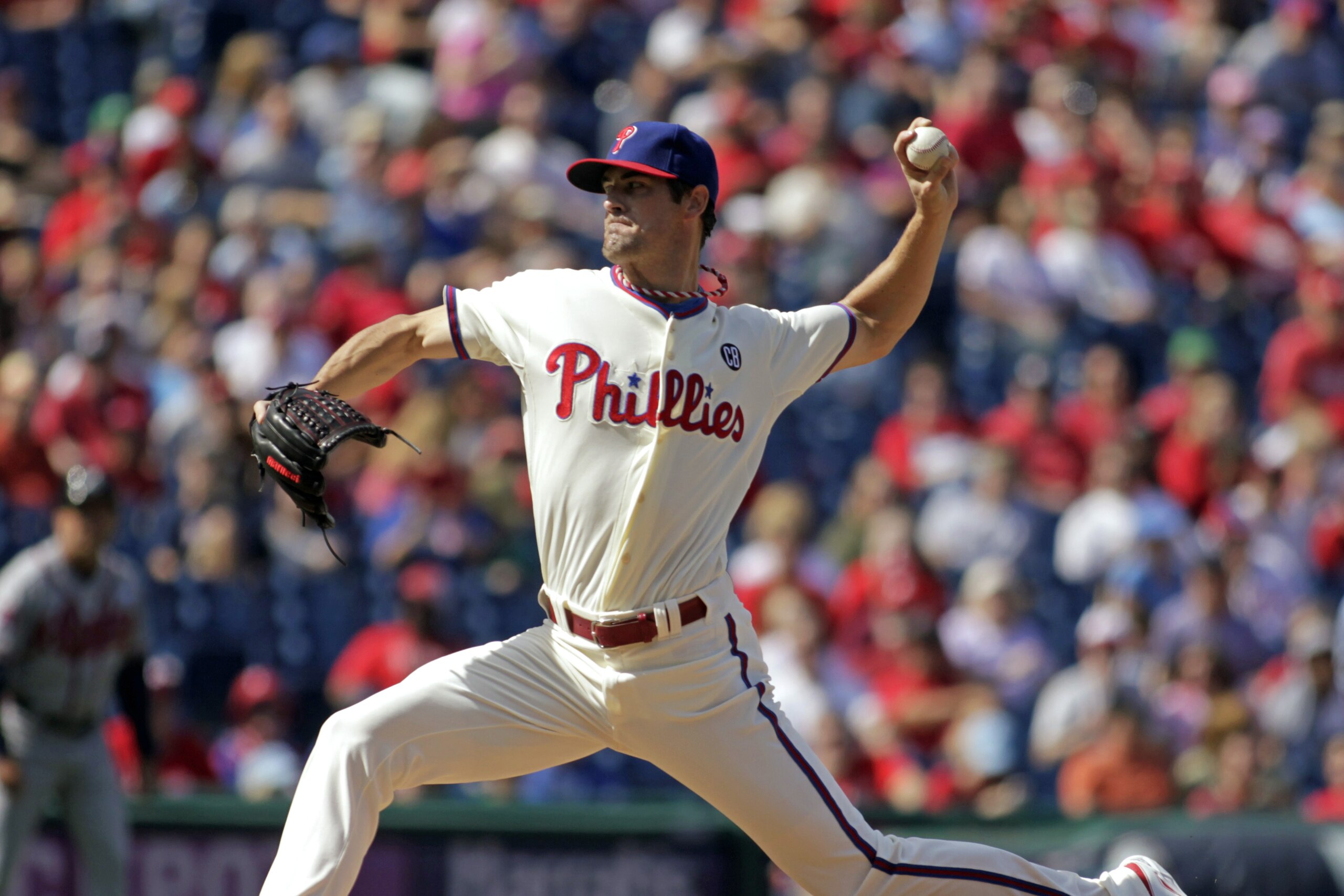 Philadelphia Phillies starting pitcher Cole Hamels throws against the Atlanta Braves in the first inning of a baseball game Sunday, Sept. 28, 2014, in Philadelphia. (AP Photo/H. Rumph Jr)