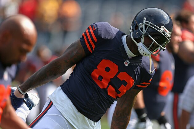 CHICAGO, IL - SEPTEMBER 28:  Martellus Bennett #83 of the Chicago Bears streches during warmups before their game against the Green Bay Packers at Soldier Field on September 28, 2014 in Chicago, Illinois. (Photo by Jonathan Daniel/Getty Images)