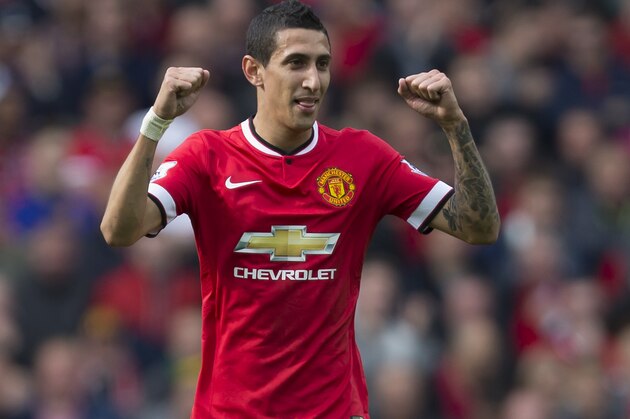Manchester United's Angel Di Maria celebrates after scoring against Everton during their English Premier League soccer match at Old Trafford Stadium, Manchester, England, Sunday Oct. 5, 2014. (AP Photo/Jon Super)
