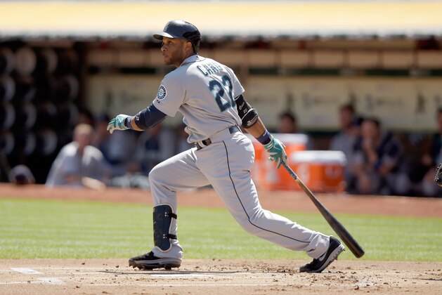 OAKLAND, CA - SEPTEMBER 03:  Robinson Cano #22 of the Seattle Mariners bats against the Oakland Athletics at O.co Coliseum on September 3, 2014 in Oakland, California.  (Photo by Ezra Shaw/Getty Images)