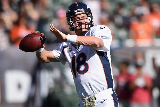 OAKLAND, CA - NOVEMBER 09: Peyton Manning #18 of the Denver Broncos warms up against the Oakland Raiders at O.co Coliseum on November 9, 2014 in Oakland, California. (Photo by Thearon W. Henderson/Getty Images)