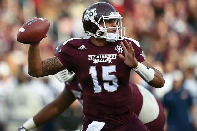 STARKVILLE, MS - NOVEMBER 08:  Dak Prescott #15 of the Mississippi State Bulldogs drops back to pass against the Tennessee Martin Skyhawks during the first quarter of a game at Davis Wade Stadium on November 8, 2014 in Starkville, Mississippi.  (Photo by Stacy Revere/Getty Images)