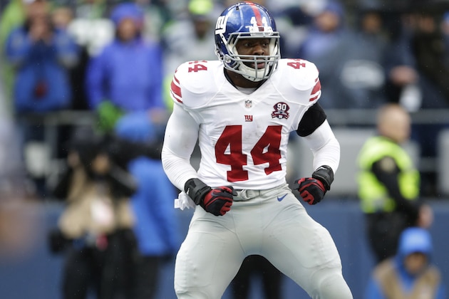 New York Giants running back Andre Williams celebrates after he scored a touchdown in the first half of an NFL football game against the Seattle Seahawks, Sunday, Nov. 9, 2014, in Seattle. (AP Photo/Scott Eklund)