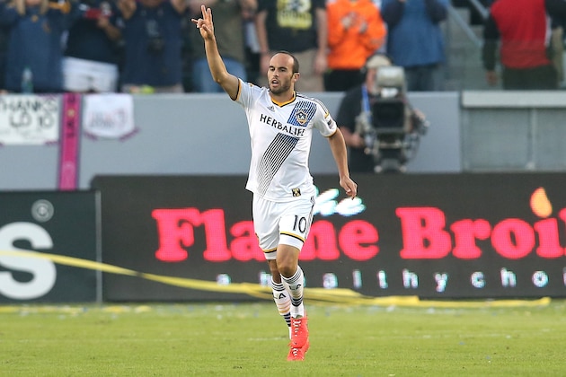 LOS ANGELES, CA - NOVEMBER 09:  Landon Donovan  #10 of the Los Angeles Galaxy celebrates as he returns to midfield after scoring the Galaxy's first goal against Real Salt Lake in Leg 2 of the Western Conference Semifinals at StubHub Center on November 9, 2014 in Los Angeles, California.  (Photo by Stephen Dunn/Getty Images)