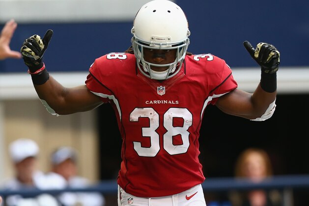 ARLINGTON, TX - NOVEMBER 02:   Andre Ellington #38 of the Arizona Cardinals celebrates his touchdown against the Dallas Cowboys in the fourth quarter at AT&T Stadium on November 2, 2014 in Arlington, Texas.  (Photo by Ronald Martinez/Getty Images)