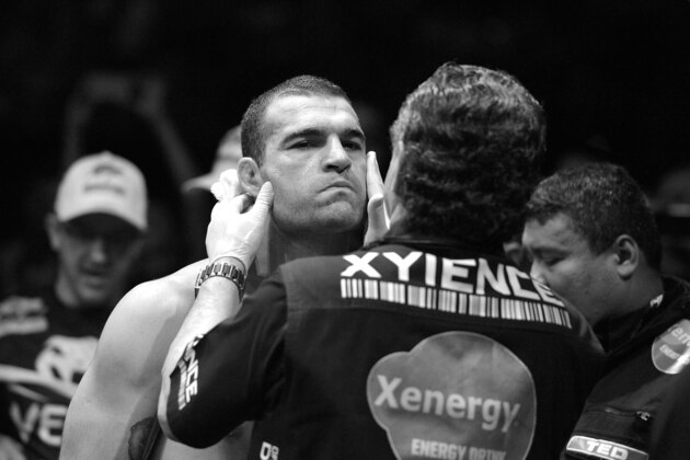 BRISBANE, AUSTRALIA - DECEMBER 07: (Editors notes: This digital image has been converted to black and white) Shogun Rua of Brazil is checked by Jacob 'Stitch' Duran before his bout against James Te Huna of Australia at the UFC Fight Night at the Brisbane Entertainment Centre on December 7, 2013 in Brisbane, Australia.  (Photo by Bradley Kanaris/Getty Images)