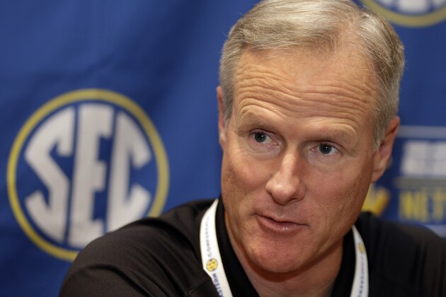 Missouri head coach Kim Anderson answers a question during a news conference at the Southeastern Conference NCAA men's college basketball media day in Charlotte, N.C., Wednesday, Oct. 22, 2014. (AP Photo/Chuck Burton)