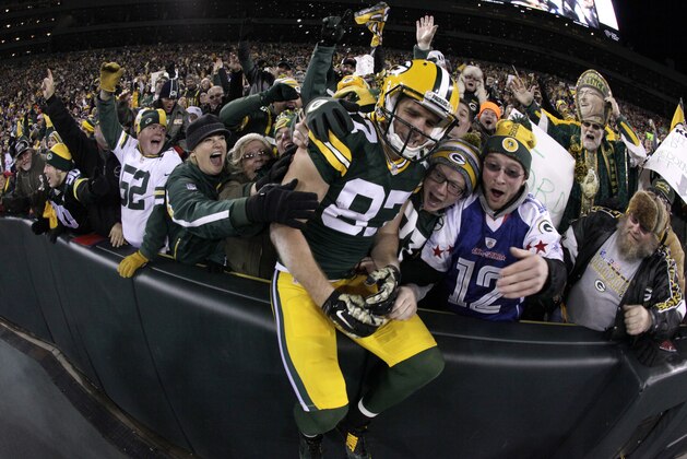 Green Bay Packers wide receiver Jordy Nelson (87) celebrates a touchdown with fans during the first half of an NFL football game against the Chicago Bears Sunday, Nov. 9, 2014, in Green Bay, Wis. (AP Photo/Morry Gash)