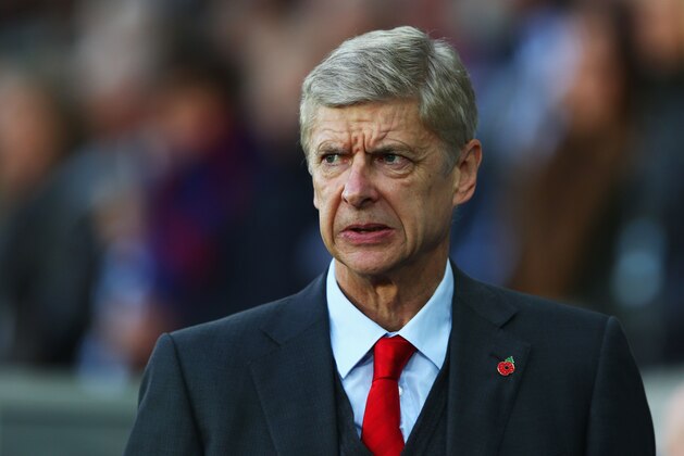 SWANSEA, WALES - NOVEMBER 09:  Arsene Wenger manager of Arsenal looks on prior to the Barclays Premier League match between Swansea City and Arsenal at Liberty Stadium on November 9, 2014 in Swansea, Wales.  (Photo by Michael Steele/Getty Images)