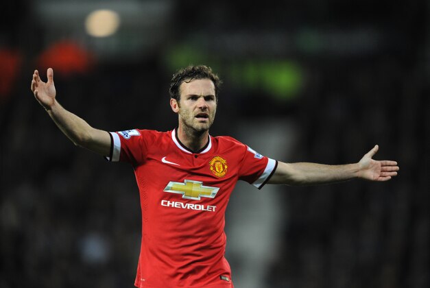 Manchester United's Juan Mata during the English Premier League soccer match between West Bromwich Albion and Manchester United at the Hawthorns, Birmingham, England, Monday, Oct. 20, 2014. (AP Photo/Rui Vieira)