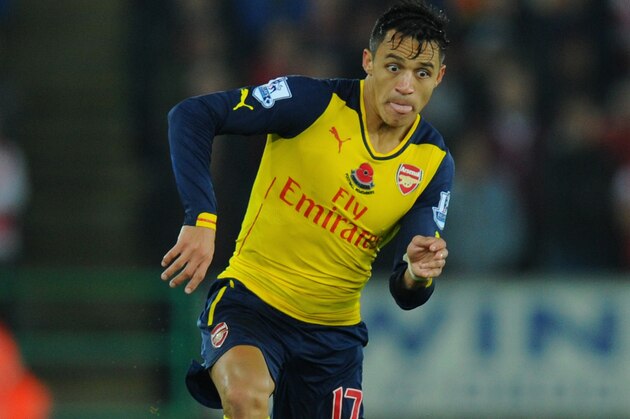 SWANSEA, WALES - NOVEMBER 09:  Arsenal player Alexis Sanchez in action during the Barclays Premier League match between Swansea City and Arsenal at Liberty Stadium on November 9, 2014 in Swansea, Wales.  (Photo by Stu Forster/Getty Images)