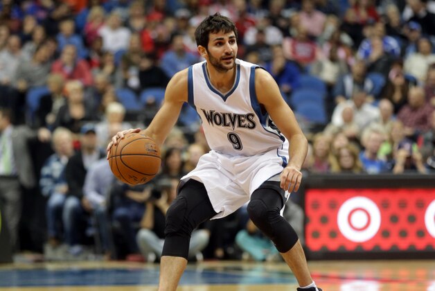 Minnesota Timberwolves' Ricky Rubio of Spain dribbles in the first quarter of an NBA basketball game against the Chicago Bulls, Saturday, Nov. 1, 2014, in Minneapolis. (AP Photo/Jim Mone)