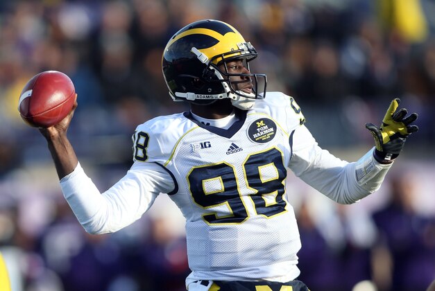 Nov 8, 2014; Evanston, IL, USA; Michigan Wolverines quarterback Devin Gardner (98) throws a pass against the Northwestern Wildcats in the first half at Ryan Field. Mandatory Credit: Jerry Lai-USA TODAY Sports