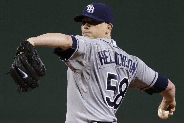 Tampa Bay Rays starting pitcher Jeremy Hellickson delivers to the Boston Red Sox during the first inning of a baseball game at Fenway Park in Boston,Thursday, Sept. 25, 2014. (AP Photo/Charles Krupa)
