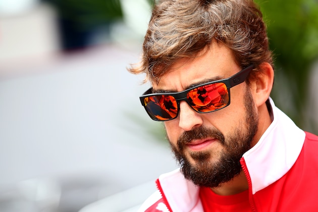 SAO PAULO, BRAZIL - NOVEMBER 06:  Fernando Alonso of Spain and Ferrari looks on during previews ahead of the Brazilian Formula One Grand Prix at Autodromo Jose Carlos Pace on November 6, 2014 in Sao Paulo, Brazil.  (Photo by Mark Thompson/Getty Images)