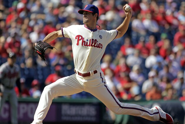 Philadelphia Phillies starting pitcher Cole Hamels throws against the Atlanta Braves in the first inning of a baseball game Sunday, Sept. 28, 2014, in Philadelphia. (AP Photo/H. Rumph Jr)