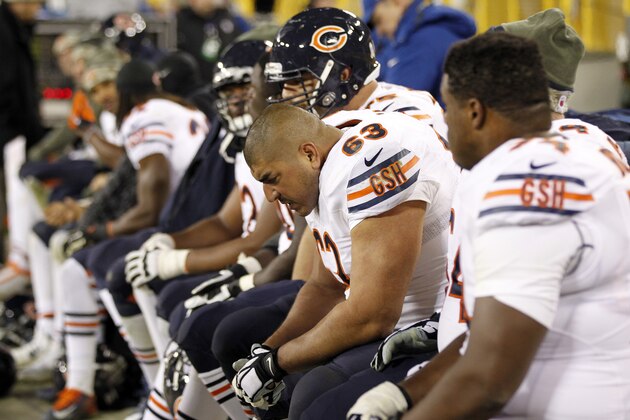 Chicago Bears players sit in the bench during the second half of an NFL football game against the Green Bay Packers Sunday, Nov. 9, 2014, in Green Bay, Wis. The Packers won 55-14. (AP Photo/Mike Roemer)