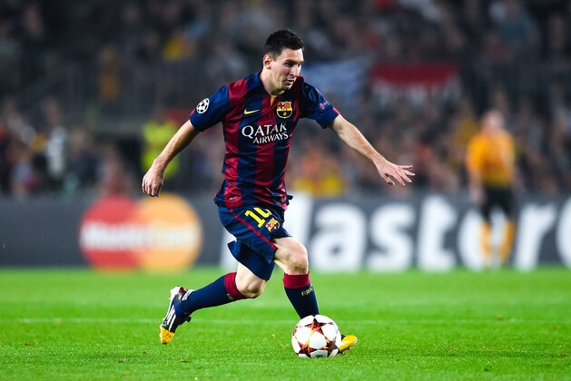BARCELONA, SPAIN - OCTOBER 21:  Lionel Messi of FC Barcelona runs with the ball during a UEFA Champions League Group F match between FC Barcelona and AFC Ajax at the Camp Nou Stadium on October 21, 2014 in Barcelona, Spain.  (Photo by David Ramos/Getty Images)