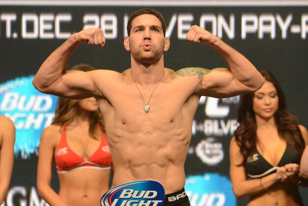 Dec 27, 2013; Las Vegas, NV, USA; Chris Weidman weighs-in for his UFC Middleweight Title Fight against Anderson Silva (not pictured) at MGM Grand Garden Arena. Mandatory Credit: Jayne Kamin-Oncea-USA TODAY Sports