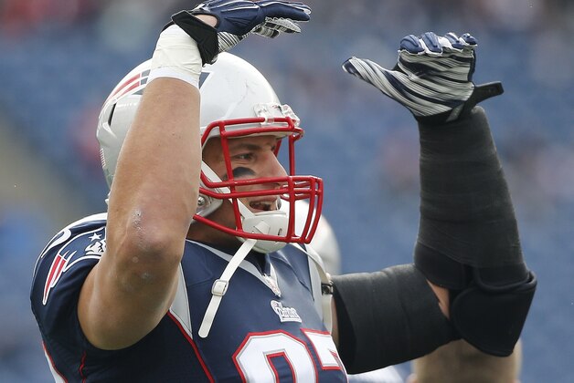 New England Patriots tight end Rob Gronkowski warms up before an NFL football game against the Chicago Bears on Sunday, Oct. 26, 2014, in Foxborough, Mass. (AP Photo/Elise Amendola)
