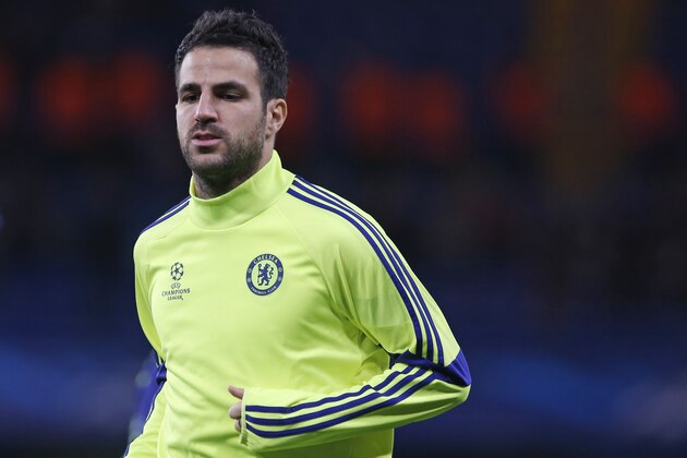 Chelsea's Cesc Fabregas warms prior to the Group G Champions League match between Chelsea and Maribor at Stamford Bridge stadium in London, Britain, Tuesday, Oct. 21, 2014. (AP Photo/Alastair Grant)