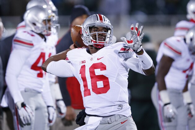 EAST LANSING, MI - NOVEMBER 8: J.T. Barrett #16 of the Ohio State Buckeyes warms up before the game against the Michigan State Spartans at Spartan Stadium on November 8, 2014 in East Lansing, Michigan. (Photo by Joe Robbins/Getty Images)